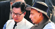 Union Home Minister Rajnath Singh with Minister of State for Home Kiren Rijiju in New Delhi on Tuesday.