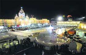 The illuminated Golden Temple entrance plaza on the eve of Diwali in Amritsar on Wednesday