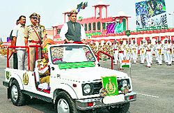 Union Home Minister Rajnath Singh inspects the guard of honour at the Raising Day parade of ITBP in Noida on Friday