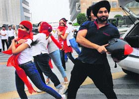 Students perform a flash mob at Elante Mall in Industrial Area, Phase I, Chandigarh, on Saturday