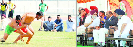 Players slug it out during a kabaddi match; and (right) Sikander Singh Mulaka, chairman of the selection committee (extreme left), interacts with Kuldeep Singh, vice-president of the Indian Olympic Association in Ludhiana on Saturday.