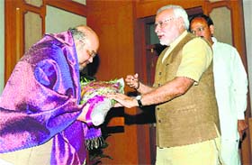 PM Narendra Modi felicitates BJP chief Amit Shah at a high tea for NDA MPs in New Delhi on Sunday