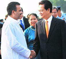 Vietnamese Prime Minister Nguyen Tan Dung is received by Minister of State Sanjeev Balyan upon his arrival in New Delhi on Monday.