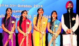 Students take part in a group song competition during the youth festival at DAV College in Sector 10, Chandigarh, on Tuesday