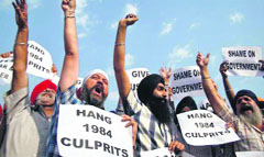 A file photo of a protest by 1984 riot victims 