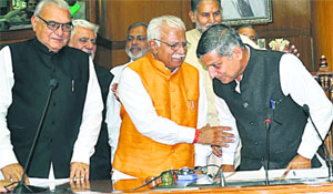 Haryana Assembly Speaker Kanwar Pal Gurjar (R) with CM Manohar Lal Khattar and former CM BS Hooda in Chandigarh.