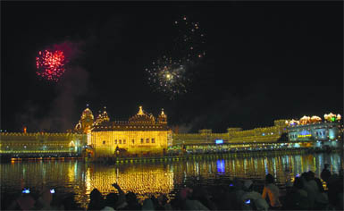 Fireworks at the Golden Temple on the birth anniversary of Guru Nanak Dev in Amritsar. 