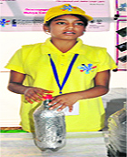Kajal, a Class IX student from Government High School, Maloya Colony, exhibits her project.