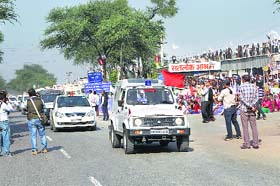 Vehicles of top Haryana police officers during a flag march outside Satlok Ashram in Barwala on Saturday
