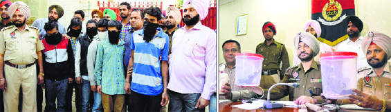The arrested members of the gang in police custody; and (right) Jaswinder Singh, Assistant Commissioner of Police (Crime), addresses a press conference.