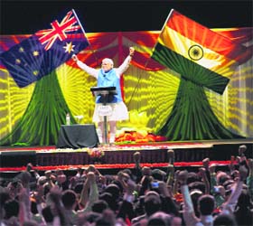 Sydney bonhomie: Prime Minister Narendra Modi addresses people at Allphones Arena in Sydney on Monday