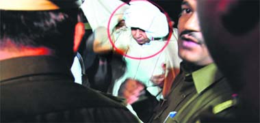 Haryana police take Rampal to the Panchkula civil hospital for medical examination late on Wednesday night