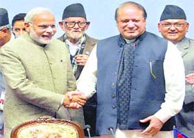 PM Narendra Modi shakes hands with his Pakistani counterpart Nawaz Sharif at the SAARC Summit in Kathmandu