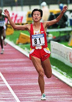 Chinese Lili Yin jubilates after winning the 5000m women's race during the 7th World Junior Track and Field Championship in Annecy, southeastern France, on Sunday. — AP/PTI