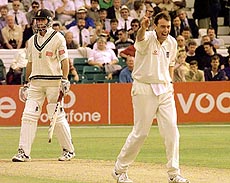 England's Angus Fraser (right) claims the wicket of South African captain Hansie Cronje, lbw for 57 runs during the South African Ist innings in the 5th and the final Test match at Headingley in Leeds on Friday. Fraser took 5 for 42 as South Africa were bowled out for 252.— AP/PTI