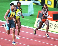 US sprinter Marion Jones (left) runs to victory during 100 m race at the Golden League Meeting in Zurich on Wednesday, ahead of Merlene Ottey of Jamaica (center) and US-sprinter Chryste Gaines. Jones won with a time of 10.77 seconds. — AP/PTI