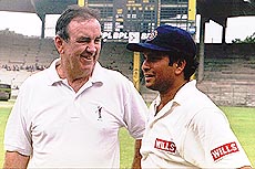 Former Australian captain Bobby Simpson, who has been hired as a consultant by the Indian cricket board, chats with Sachin Tendulkar in Chennai on Tuesday. Tendulkar is heading to Australia to take part in the birthday celebrations of cricketing legend Don Bradman. AP/PTI