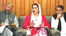 Former Pakistani Prime Minister Benazir Bhutto  and fellow Opposition leaders  discuss strategy.