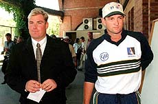 ADELAIDE : Shane Warne (left) and Mark Waugh leave the Adelaide Oval after a press conference on Wednesday, where the Australian cricketers admitted they took money from Indian bookmaker in 1994 while on tour in Pakistan. PTI