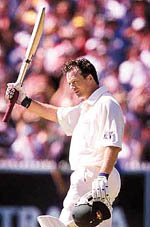 Steve Waugh celebrates his century Monday as his team minimised England's promising start on the third day of the Fourth Test in Melbourne on Monday. AP/PTI