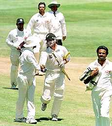 WELLINGTON : New Zealand batsman Dion Nash (center) is congratulated by the Indian players after he hit the winning run to win the cricket test played at Wellington, New Zealand, on Wednesday. AP/PTI