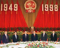 BEIJING : Chinese President Jiang Zemin (third from right) and other Chinese leaders stand before the opening of the National Day banquet at the Great Hall of the People in Beijing on Wednesday. Despite catastrophic floods and pressure from the global financial crisis, China has managed to keep its economy strong and its reforms on track, Premier Zhu Rongji said Wednesday as China celebrated its 49th year under Communist Party rule. AP/PTI