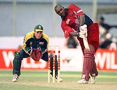 West Indian batsman Philo Wallace hits a ball for six off the bowling of South Africa's Derek Crookes in the final of the ICC Wills International Cup in Dhaka on Sunday. Wallace got his century, but was out at 103. AP/PTI