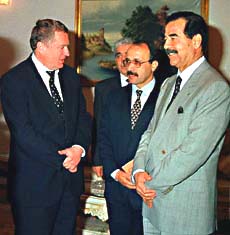 Visiting Russian legislator Vladimir Zhirinovsky meets with Iraqi leader Saddam Hussein in Baghdad 