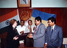 Ms Alla Savchenko (extreme left), Chairperson of the Ukrainian Federation of Professional Accountants and Auditors (UFPPA) and Mr Rahul Roy (centre), president of the Institute of Chartered Accountants of India (ICAI), exchanging documents of a memorandum of understanding for setting up of a regulatory accounting body on the lines of ICAI in Ukraine, in New Delhi on Monday