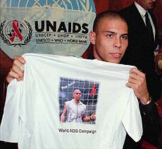 GENEVA : Famous Brazilian soccer player "Ronaldo" Luiz Lazario de Lima of Inter-Milan, Italy, shows a T-shirt of the World AIDS Campaign during a press conference to promote a UN campaign to increase awareness of the dangers of the AIDS virus among young people at Geneva, Switzerland, on Monday — AP/PTI