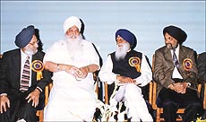 Dr Prithipal Singh, Harbhajan Singh Yogi, Mr Gurcharan Singh Tohra and Vice-Chancellor Joginder Singh Puar .