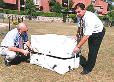 Israeli experts exhibit a cube-shaped air and water tight storehouse used for storing foodgrain.