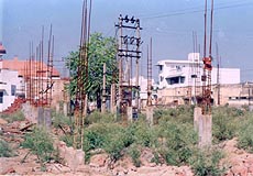 Illegal construction on government land. — photo by T.C. Malhotra