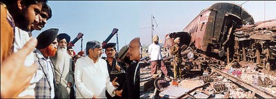 Mr Nitish Kumar, Union Railways Minister, along with the Punjab Chief Minister, Mr Parkash Singh Badal, at the site of the accident