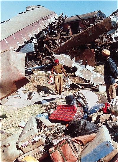 Luggage of the passengers of the ill-fated trains lies strewn around at the site of the accident