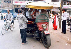 A Harley Davidson cycle rickshaw.