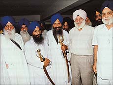 The SGPC president, Mr Gurcharan Singh Tohra, and the World Sikh Council president, Justice Kuldip Singh (right) arrive for a meeting of the council alongwith Takht Jathedars Prof Manjit Singh and Bhai Kewal Singh at Sri Kalgidhar Niwas in Chandigarh, on Thursday.