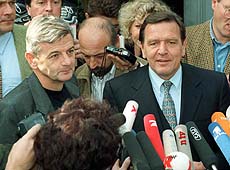 BONN : German chancellor-elect Gerhard Schroeder (right) and the possible foreign minister, Greens party faction leader Joschka Fischer (left) deliver a statement after their coalition talks in Bonn on Thursday. AP/PTI