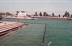 Lakhs of pilgrims take a holy dip in the Brahm Sarovar during solar eclipse
