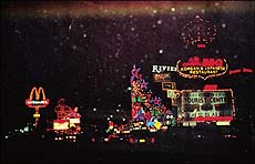 Bright lights and dazzling neon signs at downtown Vegas