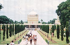 The walls of the cream-coloured mausoleum are lined with tiger skin