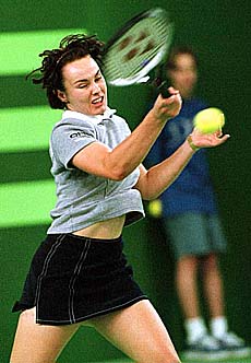 FILDERSTADT, GERMANY : Switzerland's Martina Hingis returns a ball during her match against Russia's Anna Kournikova at the Porsche Grand Prix tennis tournament in Filderstadt on Wednesday. Hingis won by 1-6, 6-2 and 6-2. AP/PTI