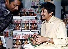 Acclaimed ladycop Kiran Bedi signs an autograph for a fan on her latest book at a popular book store in Sector 17, Chandigarh, on Friday — A Tribune photo