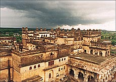 The gleaming turrets of Raj Mehal under monsoon clouds