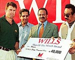 Australian skipper Mark Taylor (left) receives his Man of the Match award after the drawn second cricket Test against Pakistan Monday, at the Arbab Niaz Stadium in Peshawar, Pakistan. AP/PTI