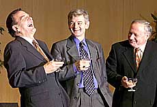 Social Democratic Chancellor-elect Gerhard Schroeder (left) shares a laugh with Greens party leader Joschka Fischer (center) and Social Democratic Party Chairman Oskar Lafontaine.