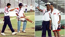Dhaka: (Left) Sachin Tendulkar along with Ajit Agarkar walk towards the nets for a practice session and (right) skipper Mohammed Azharuddin talks with team manager Anshuman Gaekwad at the Bangabandhu stadium in Dhaka on Tuesday. India will meet Australia in the ICC Wills International Cup one-day match on Wednesday — PTI