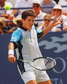 Tim Henman, of Great Britain, returns the ball to Scott Draper, of Australia, at the U.S. Open tennis tournament in New York on Wednesday. Henman defeated Draper 6-3, 7-6 (7-4), 7-6 (7-3). AP/PTI