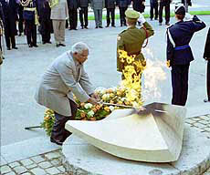 LUXEMBOURG : Indian President K. R. Narayanan reanimates the flame at the National Solidarity Monument in Luxembourg on Tuesday. 