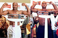 Atlanta, USA: WBA and IBF heavyweight champion Evander Holyfield (left) and Vaughn Bean (right) pose after their weigh-in Atlanta on Thursday. They will fight for IBF heavyweight title on Saturday night. — AP/PTI